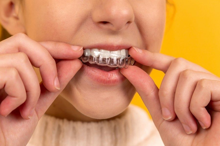 Dental professional consulting a patient