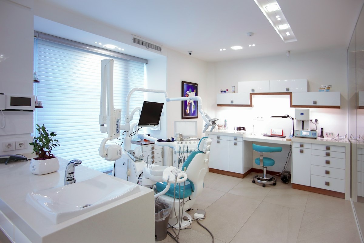 Dental team standing together in a modern clinic